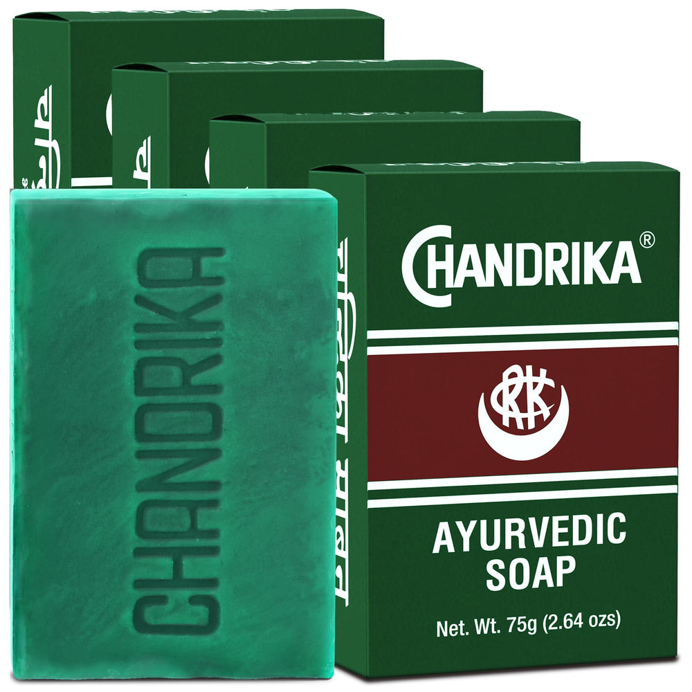 Chandrika Ayurvedic Soap bar unwrap reveals natural ingredients for daily cleansing.