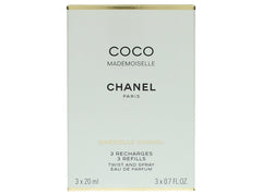 Chanel Coco Mademoiselle bottle closeup highlights elegant design and the signature scent vibe.