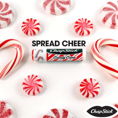 ChapStick Candy Cane lip balm in use on lips for smooth moisture.