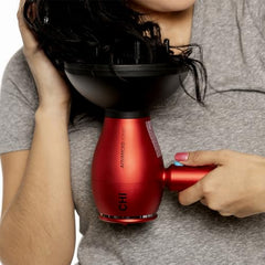 CHI 1875 Series compact hair dryer in-hand for on-the-go styling.