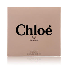 Chloe New for Women EDP bottle on nightstand suggests a refined fragrance ritual.