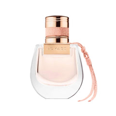 Chloe Nomade bottle curves highlight soft, feminine design with a modern metallic accent for everyday elegance.