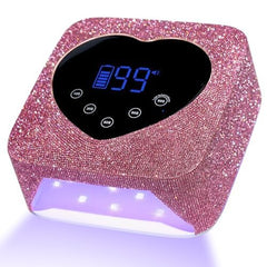 Christine Shelly nail lamp front view shows pink, sparkly design for fast, even home curing.