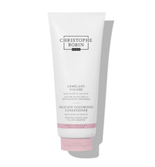 Christophe Robin Delicate Volumizing Conditioner bottle shows rose extracts for featherweight volume.