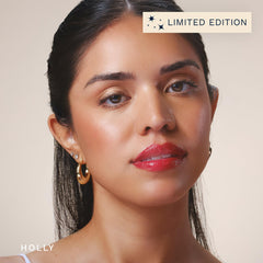 City Beauty City Lips Holly on lips with wand instantly adds sheen and plumpness.