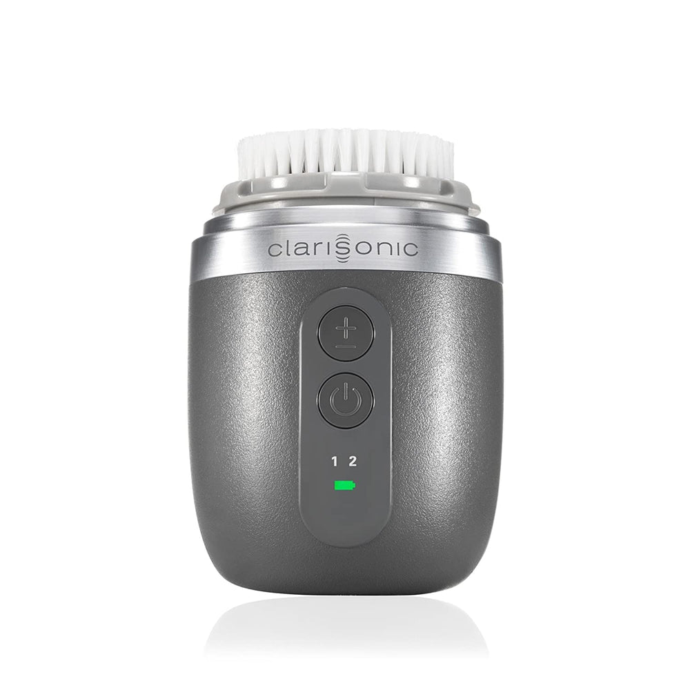 Clarisonic Alpha FIT men's face brush in grey from the front with ergonomic handle.