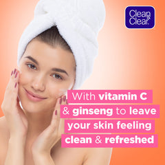 Clean & Clear Morning Energy scrub foamy lather on skin fits daily cleansing ritual.