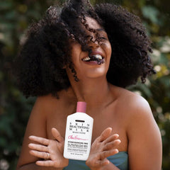 Clear Essence Exclusive Skin Beautifying Milk swirl closeup highlights creamy texture for daily moisture