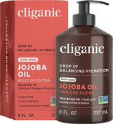 Cliganic jojoba oil pump 8oz bottle demonstrates premium skin and hair nourishment.