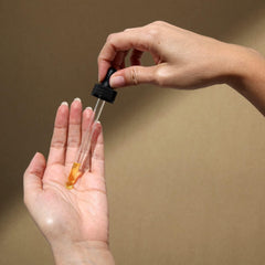 Cliganic Organic Pumpkin Seed Oil applied to skin for natural moisture and nourishing glow.
