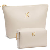 CloudWings initial makeup bag beige with monogram for a personalized touch.