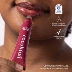 Cocokind Ceramide Lip Blur Balm swatch in burgundy with glossy finish.