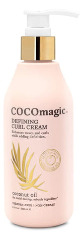 Cocomagic Defining Curl Cream bottle highlights hydrating formula for frizz control.
