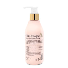 Cocomagic Defining Curl Cream applied to hair for detangling and definition.