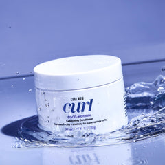 COLOR WOW conditioner texture close-up revealing creamy lightweight formula