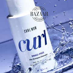 Close-up of product texture on fingers highlighting COLOR WOW smooth slip for detangling