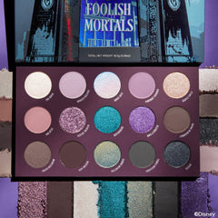 ColourPop Haunted Mansion palette shades row, showing neutrals, greys, and bold color options for versatile looks.