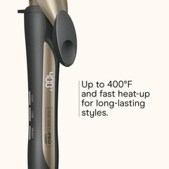 Conair Infiniti Pro clamp engages hair securely for consistent curl formation.