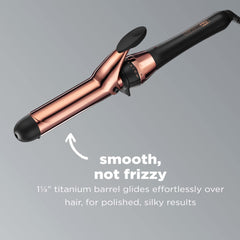 Conair Infinitipro rose gold curling iron barrel close-up showing titanium surface for smooth styling.