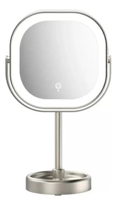 Conair rotating LED mirror with 1x/10x magnification for precise makeup detailing.