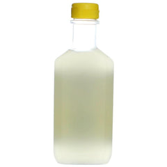 Corn Huskers hand lotion application on hands demonstrates quick penetration for dry skin relief.