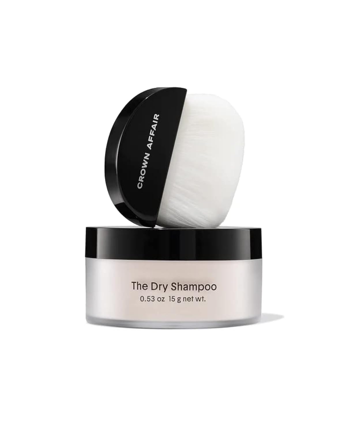 CROWN AFFAIR The Dry Shampoo fluffy brush application refreshes roots with oil absorption.