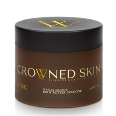 Crowned Skin King Cologned Body Butter bottle pour highlights lasting fragrance.