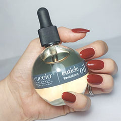 Cuccio Naturale Cuticle Oil bottle application boosts nourishing care for dry cuticles.