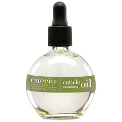 Cuccio Naturale Revitalizing Cuticle Oil bottle closeup showing a hydrating formula.