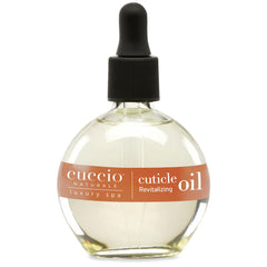 Cuccio Naturale Revitalizing Cuticle Oil bottle with vanilla sugar promotes overnight hydration.