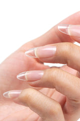 Cuccio Pro Builder Gel calcium chip-resistant clear finish on nails.