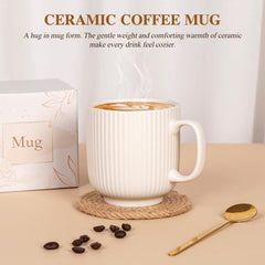 CuriBox ceramic mug with spoon for warm beverages and mindful tea rituals.