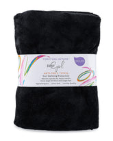 Curly Girl towel with anti-frizz focus smooths curls after washing.
