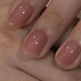 Curvlife soft gel press-on nails honey peach pink oval pack shot with natural fit