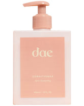 DAE Signature Conditioner bottle provides hydration for all hair types and shine.
