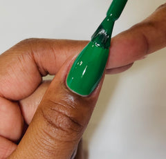 Daisy DND gel nail polish applicator close-up shows smooth brush strokes.