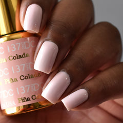 DAISY DND Pina Colada lacquer bottle showing matching shade