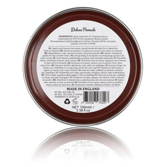 Dapper Dan Deluxe Pomade jar swirl close-up highlights textured finish and medium shine.