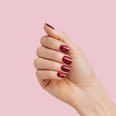 Dashing Diva Glaze Ruby Red Apple semi-cured gel glow provides salon-like shine.