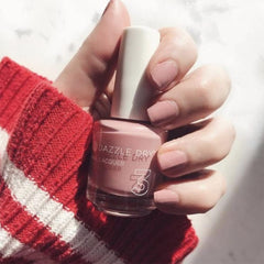 Dazzle Dry Nail Lacquer Step 3 Strawberry Macaron brush demonstrates precise, smooth application.