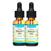 De La Cruz ear wax remover bottle pouring drops for gentle cleansing.