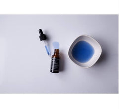 DearKlairs Midnight Blue Youth Activating Drop liquid close-up — fast-absorbing formula for sensitive skin.