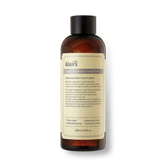 DearKlairs Supple Preparation Toner flatlay with bottle and skincare lineup.