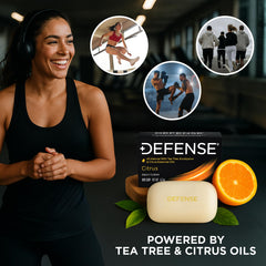 Defense Soap Citrus Bar in hand showing cleansing action after workouts.