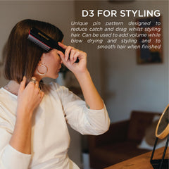 Denman D3 anti-static rubber pad close-up reducing frizz for smoother results.