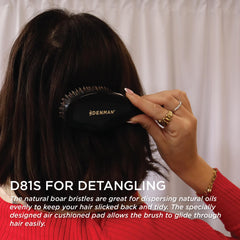 Denman cushion brush small black air-cushioned pad supports comfortable brushing and glide.