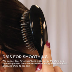 Denman cushion brush small black natural bristle close-up adds conditioning and gloss.