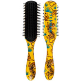 Denman D3 7-Row Brush closeup with round-ended pins for gentle detangling and curl definition.