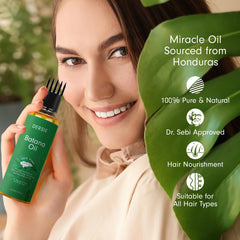 Dersie Batana Oil applied to dry hair to reduce frizz and boost shine.