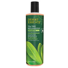 Desert Essence Tea Tree Oil Replenishing Shampoo label close-up highlights gentle-care ingredients